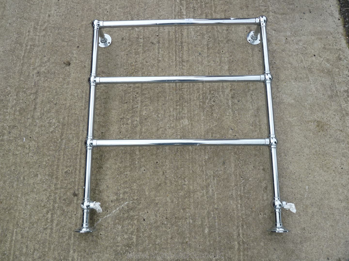 Chromed towel rail, 32'' wide x 37'' high x 7'' deep.