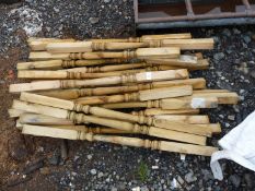 Approximately 20 soft wood decking spindles