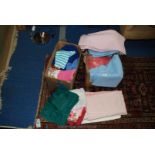 Two boxes of various bed linen and towels etc.