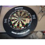 Dartboard and surround.