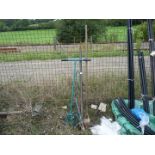 Metal pry bar, garden hoe,