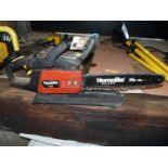 A Homelite 33 cc chainsaw.