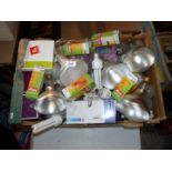 A large box of various electrical light bulbs.