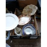 A box of various meat plates, sauce boat, etc.