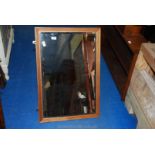 Wall hanging bevel edge mirror in fluted wooden frame, 31" x 21".