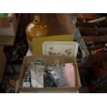 Glass vases, place mats and a stoneware jar marked Richard Cater, Wine Merchant, Bath.