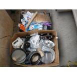 Two boxes of kitchen metalware including muffin dishes, baking trays, cleaning equipment etc.