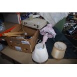 Box of miscellanea including table lamps, suit bag, audio tapes etc.