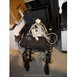 A motorised wheel chair with right arm control unit complete with power pack,