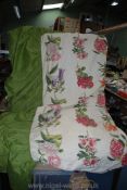 A heavy double Bedcover with attached green valance,