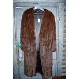 A fur coat by Renomax, Broad Street, Ross on Wye, single hook fastening.