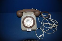 A two tone grey vintage Telephone.