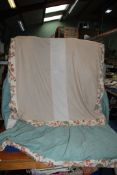 A single bed Valance in powder blue with border of birds and floral pattern fabric.