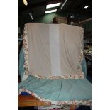 A single bed Valance in powder blue with border of birds and floral pattern fabric.