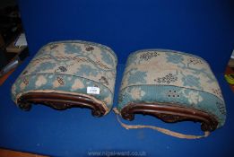 A pair of arched tapestry topped kneeling Stools with curved wooden frames, both a/f.