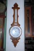 A wooden cased banjo Aneroid Barometer/thermometer.