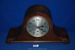 A 1920's Napoleon hat Oak cased mantle Clock with nine bar Westminster chiming movement,