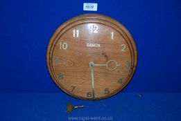 A 1960's Teak dome faced wall Clock with Swiss 18 day movement,