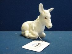 A Coalport Donkey in resting position, 3 1/2'' tall to top of ear, 4'' long.