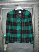 A lady's vintage black, green, orange and blue Alexon check jacket, U.K. size 12.