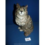 A Beswick cat in grey and white, no.1867, 8 1/2'' tall, good condition.