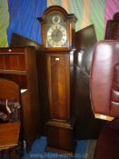 An Oak cased Long case Clock having arched face with selector to the arch for Westminster/St.