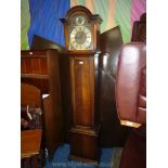 An Oak cased Long case Clock having arched face with selector to the arch for Westminster/St.