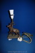 A metal table Lamp with figure of stag, and shade, 11'' tall. A/F.