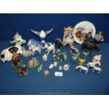 A quantity of ornaments including colourful Studio Szeiler donkey and cow, lambs, badger,