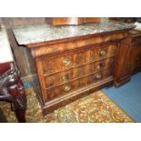 A good Oak flame patterned Walnut veneered Chest of three long Drawers plus a frieze drawer having
