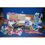 A quantity of haberdashery items including braid, ribbons, knitting needles, embroidery threads,