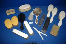 A quantity of miscellaneous dressing table items to include hand mirrors, brushes, glove stretchers,