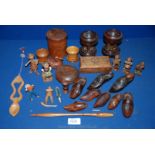 A quantity of Treen including four pairs of carved shoes, a string box, boxwood dice shakers,
