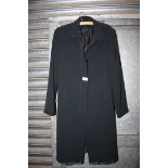 A black lightweight coat from Marks & Spencer, size 12.