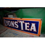 A brightly coloured enamel Lyons Tea advertising Sign, 60'' long x 17'' deep.