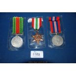 Three WWII campaign Medals including the Defence medal, War medal and the Italy Star.