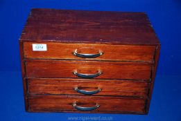 A small Pine four-drawer set of filing Drawers, 15 1/2'' long x 9 1/2'' wide x 10'' deep.