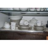 A 'Thun' Dinner/tea service comprising six cups and saucers, six dinner plates, six side plates,