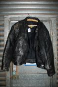 A black leather Biker's jacket by Mercure Plus, size 48.