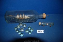 Two Ships in bottles including one miniature labelled 'Giltspur,1983',