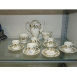 A Wedgwood part coffee set 'Beaconsfield' pattern comprising six saucers, five coffee cans,