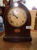 An elegant boxwood strung dark-wood Bracket Clock having two-train movement with cream coloured