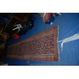 A vintage Eastern bordered, patterned and fringed Runner,