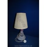 A purple and white mottled glass trumpet shaped Lamp and shade, 20'' high overall.