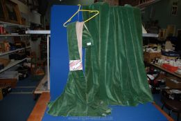 A pair of green velvet Curtains, 63'' wide, 52'' drop.