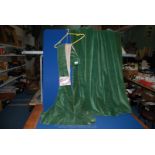 A pair of green velvet Curtains, 63'' wide, 52'' drop.