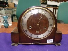 A Smiths domed Walnut type finished cased three train movement Mantel Clock,