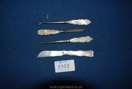 A Mother of Pearl Fruit Knife complete together with three pieces of a ladies manicure set with