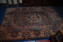 An Eastern type bordered, patterned and fringed Rug,