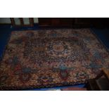 An Eastern type bordered, patterned and fringed Rug,